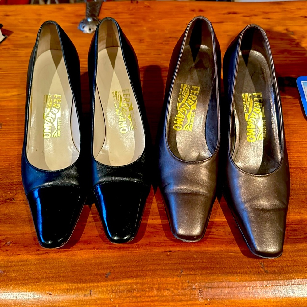 Salvatore Ferragamo black and brown pumps.